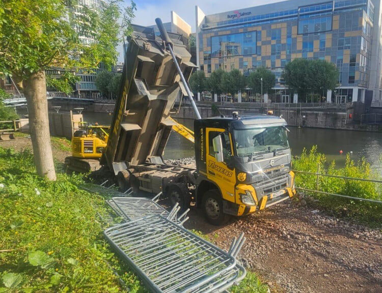 Towens Tipper lorry unloading onto ground